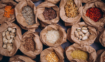 nuts and dried fruits. Spice. Food photo. Background. Wooden table. Fruits.