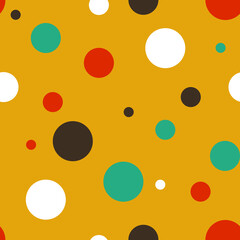 Seamless vector pattern with colourful dost on retro yellow background. Simple party spots wallpaper design. Decorative happy fashion textile.
