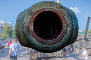 Howitzer muzzle of a knocked out artillery mount close-up