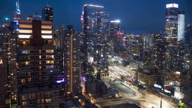 Night Falls on Manhattan.
Time lapse shot from a high angle of New York cityscape at night.