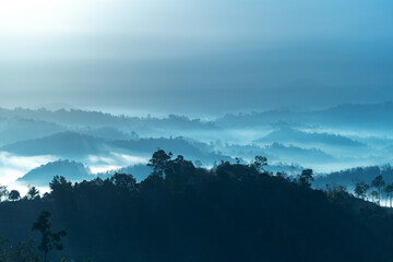 Sunrise view with blue layers of mountain in Sabah Borneo Malaysia