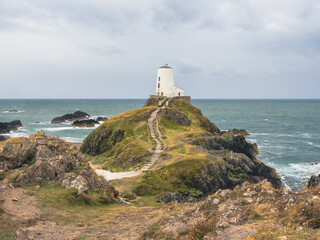 Fototapeta na wymiar lighthouse on the rocks, Goleudy Twr Mawr, Wales