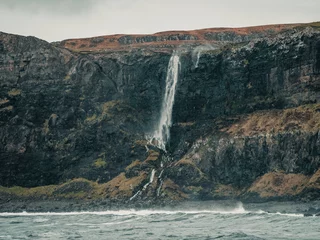 Foto op Canvas waterfall in the mountains, Talisker bay, Scotland © Joseph Naszladi