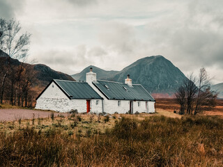 cottage in the mountains, Scotland. A view of the cottage in Glencoe in front of Stob Dearg