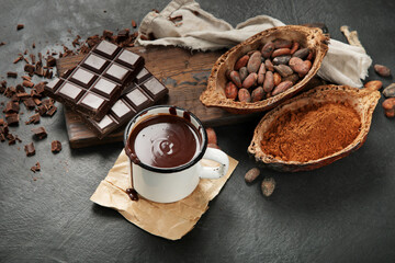 Melted chocolate drink on dark background.