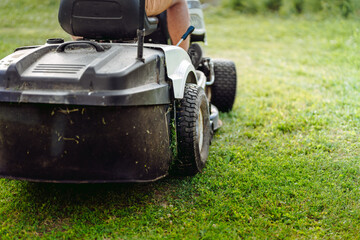 Garden maintenance details - close up view of grass mower