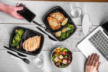 Sliced ham with fried broccoli, lemon, sesame seeds, feta cheese, tomatoes