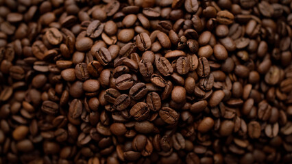 Fototapeta premium Dark roast coffee beans top view