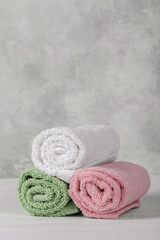 Spa composition with rolled cotton towels