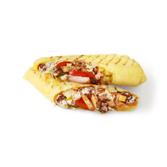 Shawarma cut in two in pita bread with chicken, tomatoes, cheese