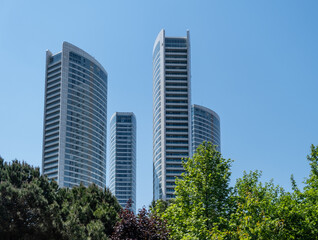 Fototapeta na wymiar Skyscrapers in city Istanbul against blue sky