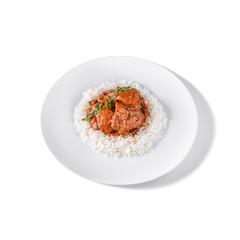 Rice with pieces of meat in sauce and parsley