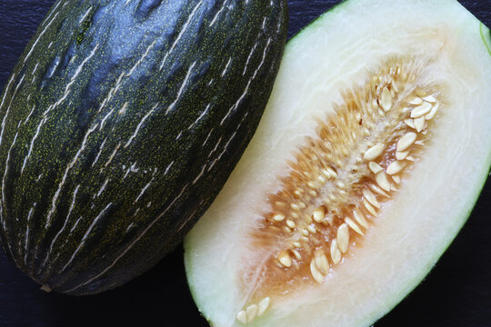 Photography of a Santa Claus melon cut in half for food illustrations