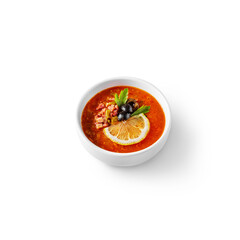 Solyanka with lemon, meat, olives and parsley