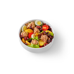 Salad with fish, egg, grapes, potatoes, lettuce and tomatoes