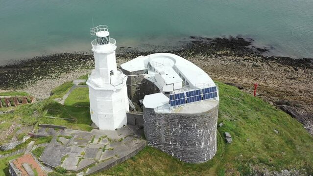 Mumbles Lighthouse and Pier, part of the Gower coastline in South Wales