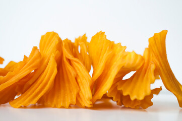 close-up, golden yellow, sweet potato chips, white background