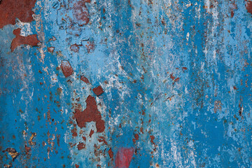 Fototapeta premium Rust surface. Grunge old rusted blue painted metal texture, rust background. Rough metallic surface with traces of rust. Widescreen grunge background rust steel. Industrial metal texture