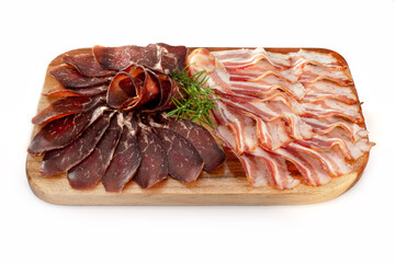 Close-up of Appetizing smoked pork brisket,  beef cured ​isolated on a white background