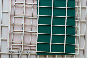 background with green paper and wooden grill