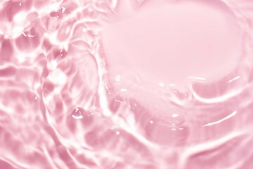 Splash cosmetic moisturizer water micellar toner or emulsion pink colored abstract background