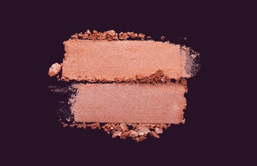 Eye shadow or bronzer brown beige nude smudge dark purple isolated background