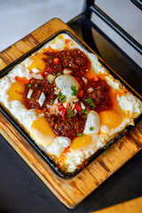 A delicious Korean dish, sizzling eggs with spicy sauce