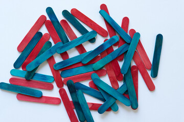 wood sticks stained blue or red