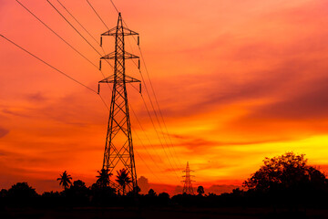 electric pole on sunset background, Sunset over the electric power lines. clean energy. High voltage electric tower . with shadow.