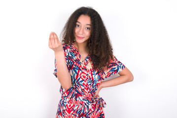 What the hell are you talking about. Shot of frustrated young beautiful girl with afro hai gesturing with raised hand doing Italian gesture, frowning, being displeased and confused with dumb question.