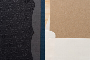 card tucked inside an envelope and fancy black paper card