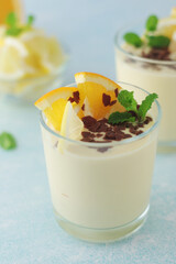 Orange lemon citrus milk mousse in glasses