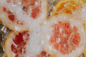 Seasonal fruit in water with rich foam and bubbles. Flat lay concept,