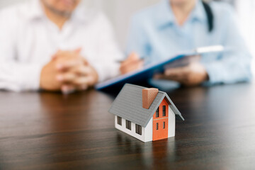 Real estate brokers or real estate agent with client or architect team Discussions about contracts , Saving money to invest in house or property in the future. Business property Concept.