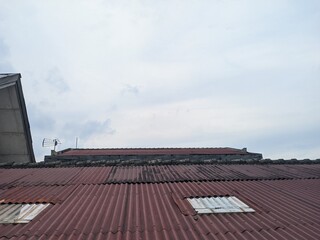 the roof of the house with a beautiful blue sky view