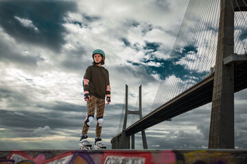 Roller skating teen in outdoors rollerblading on inline skates. Caucasian young girl in outdoor...