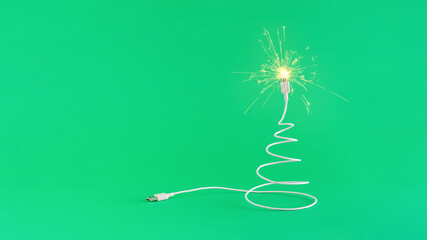 Creative digital technology Christmas arrangement made of USB cable in the shape of a Christmas...