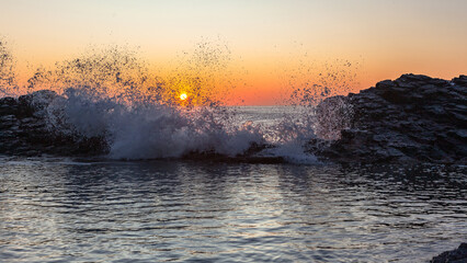 Tidal Pool Ocean Crashing Wave Spray Sunrise Landscape.