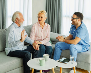 Obraz premium nurse doctor senior couple care caregiver help assistence retirement home nursing elderly man woman insurance