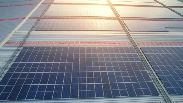 Aerial cinematic view of a solar panel on mall roof top. Aerial Drone Footage Ecology Power Conservation Concept. Clean energy production in Thailand. drone footage. 4k
