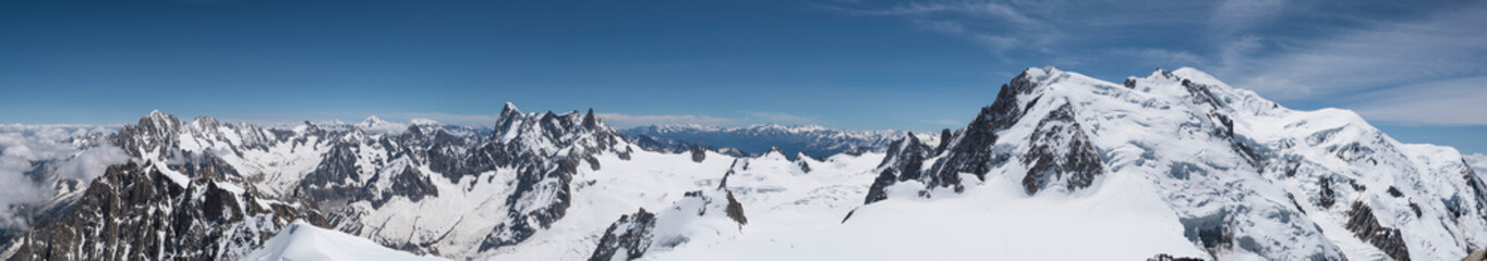 A panorama from the summit of Aiguille du Midi looking over Mont Blanc du Tacul (4248 meters) in the foreground and Mont Blanc (4808 meters) at background, Chamonix, France, Europe - obrazy, fototapety, plakaty