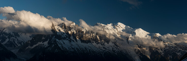 Panoramic o Les aiguilles de chamonix and the  Mont Blanc (4808 meters) at right, Chamonix, France, Europe - obrazy, fototapety, plakaty