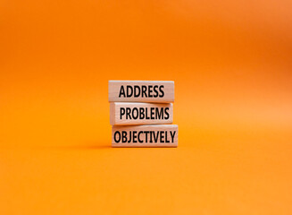 Address Problems Objectively symbol. Wooden blocks with words Address Problems Objectively. Beautiful orange background. Business and Address Problems Objectively concept. Copy space.