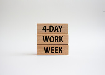 4-day work week symbol. Concept words 4-day work week on wooden blocks. Beautiful white background. Business and 4-day work week concept. Copy space