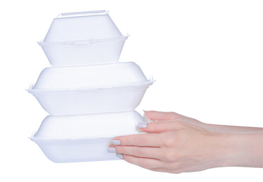 White Containers Food In Hand On White Background Isolation