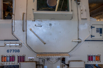 View of rear of the RG-31 Nayla Armoured Personnel Carrier (APC) showing rear hatch door, steps, and tail lights, nobody