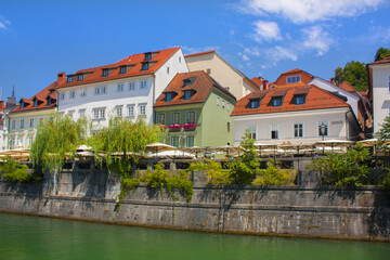 Fototapeta na wymiar Panorama of river Ljubljanica and colorful buildings in Ljubljana, Slovenia 