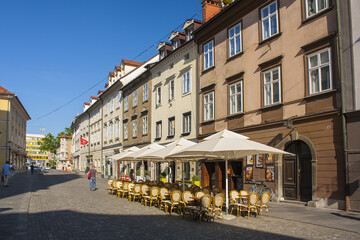 Fototapeta na wymiar Street cafe in old town of Ljubljana