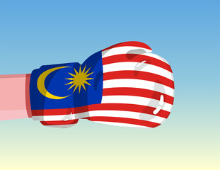 Flag of Malaysia on boxing glove. Confrontation between countries with competitive power. Offensive attitude. Separation of power. Template ready design.