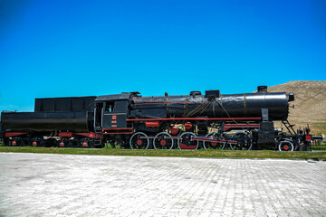 Fototapeta na wymiar Passenger wagon Train With Steam Locomotive No 56517